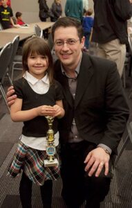 Elliott with his daughter Nadine at Washington State Elementary Chess Championships April 2017. Photo by Sarah Smoots