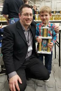 Elliott with his 4 year old son Joel at the WA State Elementary Chess Championships April 2018. Photo by Sarah Smoots