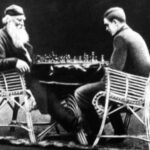 Tolstoy playing chess with the son of Vladimir Chertkov